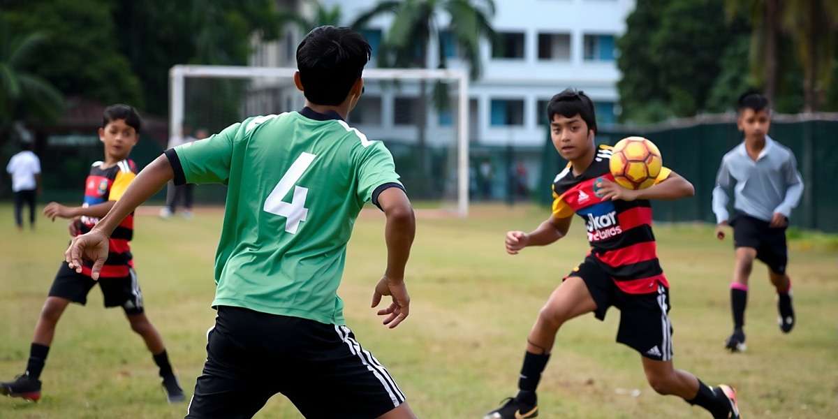 Goa Talented Youth Footballers - Match Action Intense match moment in a local Goan tournament with young players competing fiercely