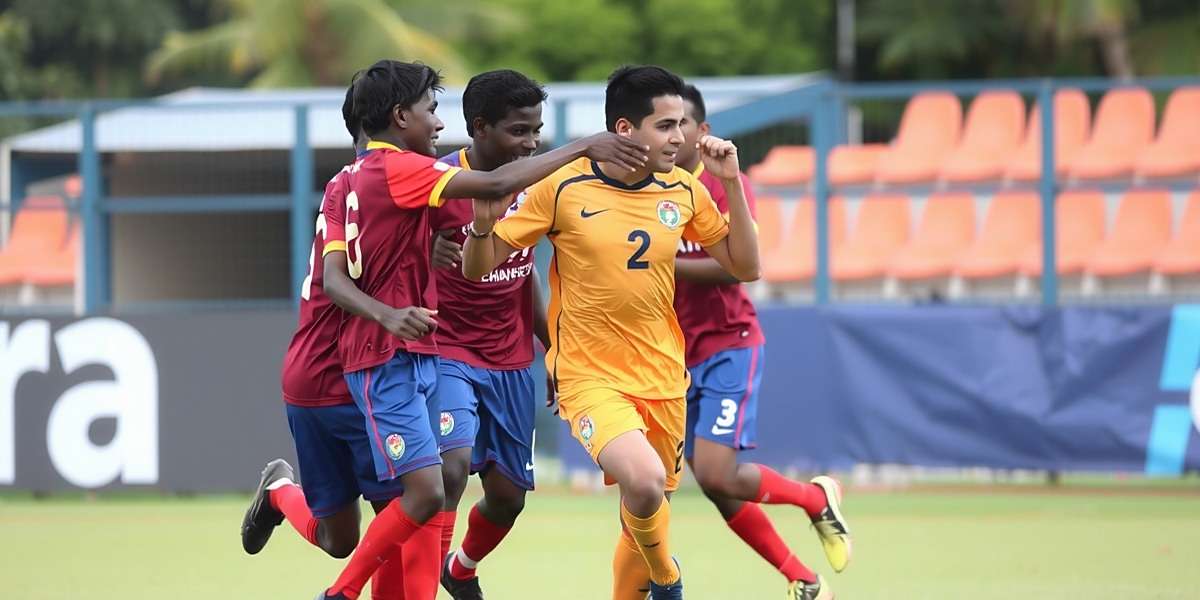 Goa Talented Youth Footballers - Celebration Moment Goan youth footballer celebrating a goal with teammates in a local tournament setting